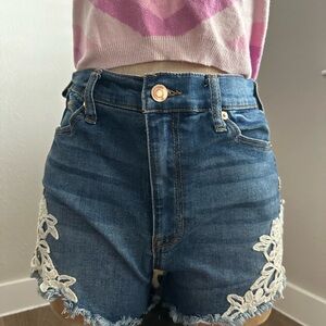 Altar'd State Blue High-Waist Denim Shorts with White Lace Appliqué